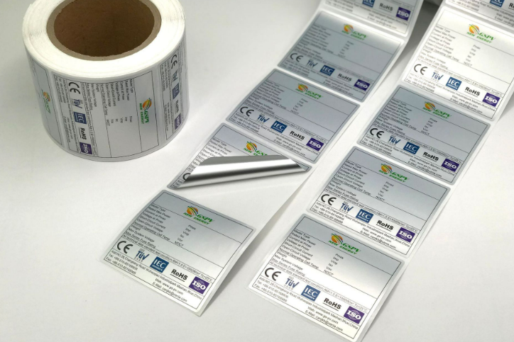 What are the common materials and characteristics of self-adhesive labels?